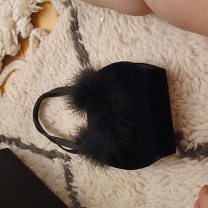 Velvet feathered clutch